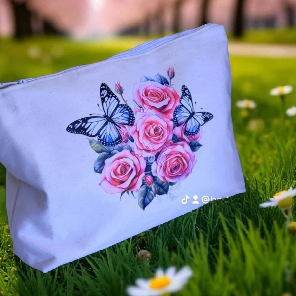 Chic White Cosmetic Bag with Floral and Butterfly Design